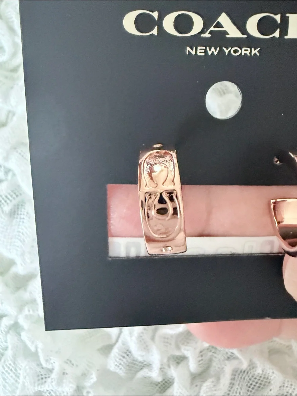 Coach Rose Gold Signature Embossed Huggie Earrings